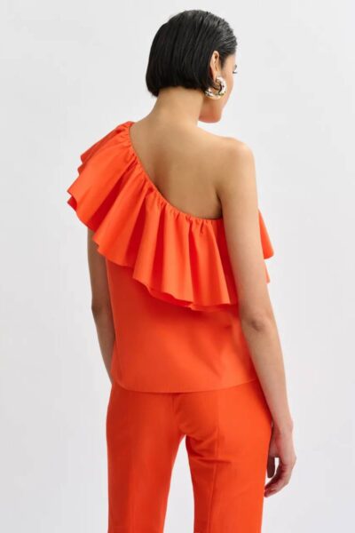 Jillian asym ruffle top fire glow Essentiel